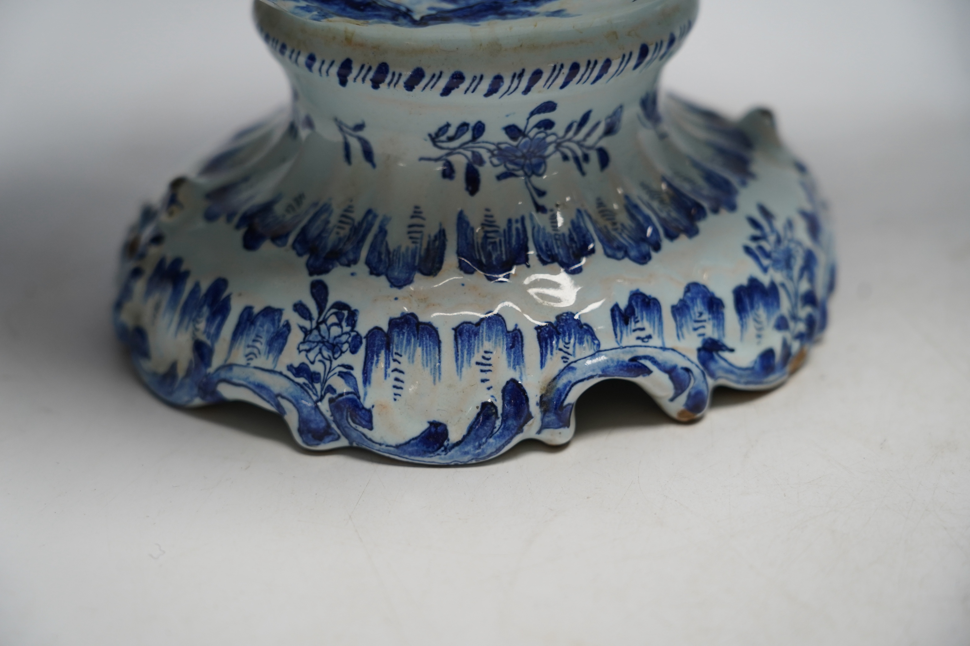A pair of 19th century Delft blue and white vases, 35cm high. Condition - poor